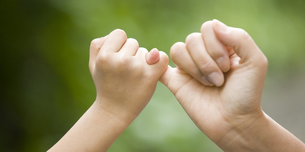 Mother and child pinky swearing, Japan